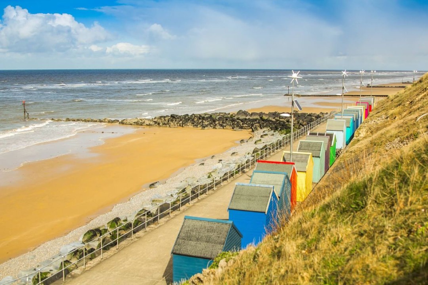 Colourful beach huts along the Sheringham coastline