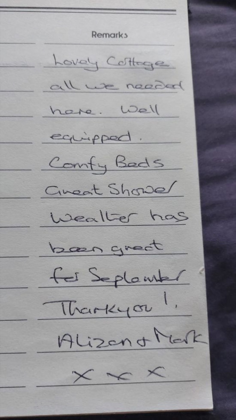 Another handwritten note from the visitors' book, praising the cottage