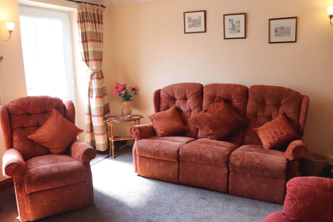 The sitting room at Splashpoint, with reclining sofas