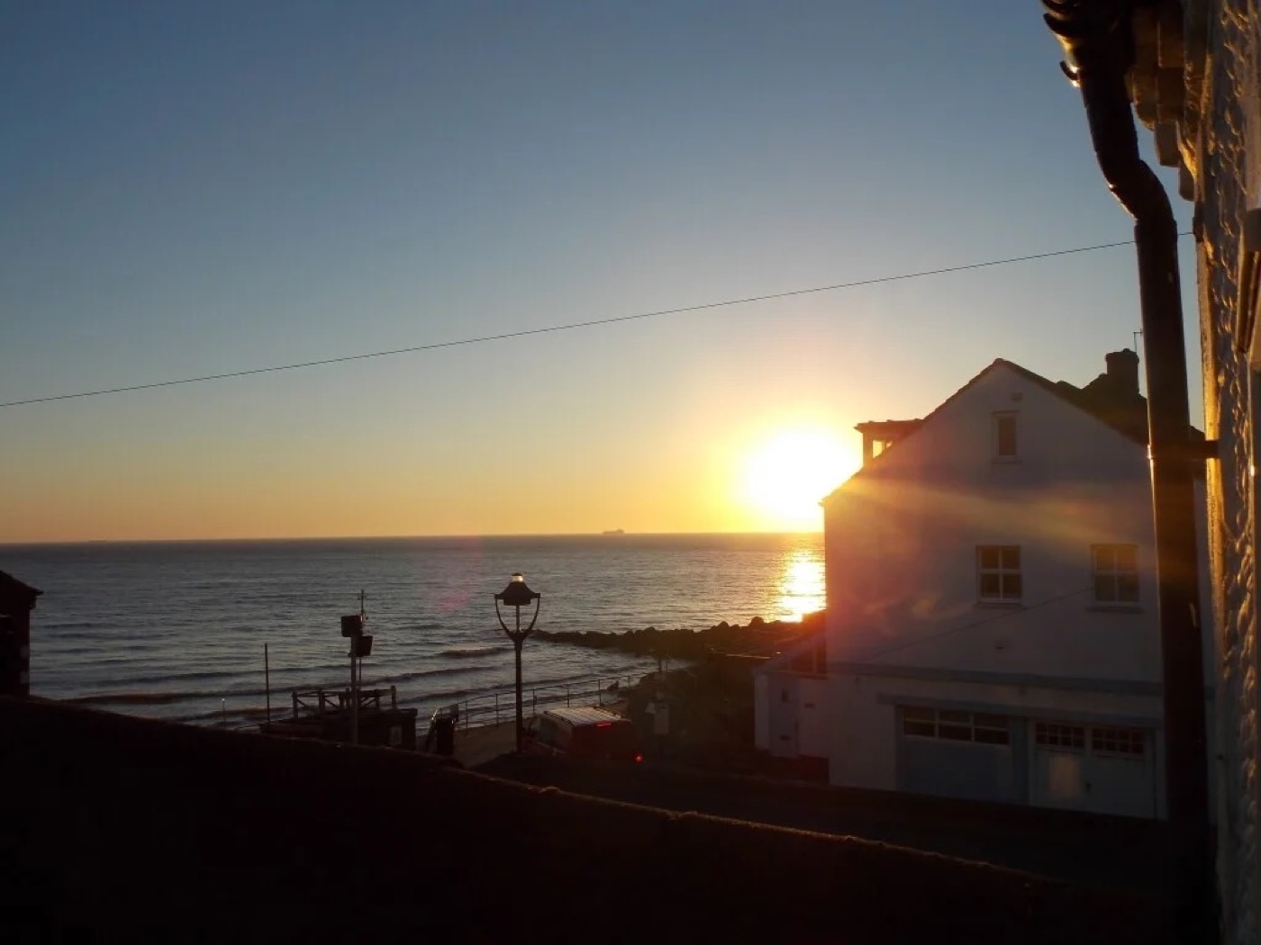 Sunset over the sea, seen from Splashpoint's upstairs window
